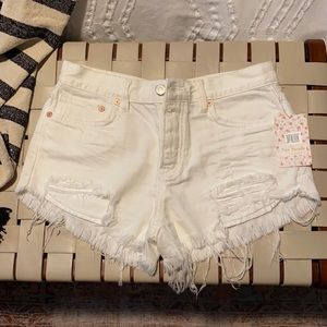 White denim cutoff shorts